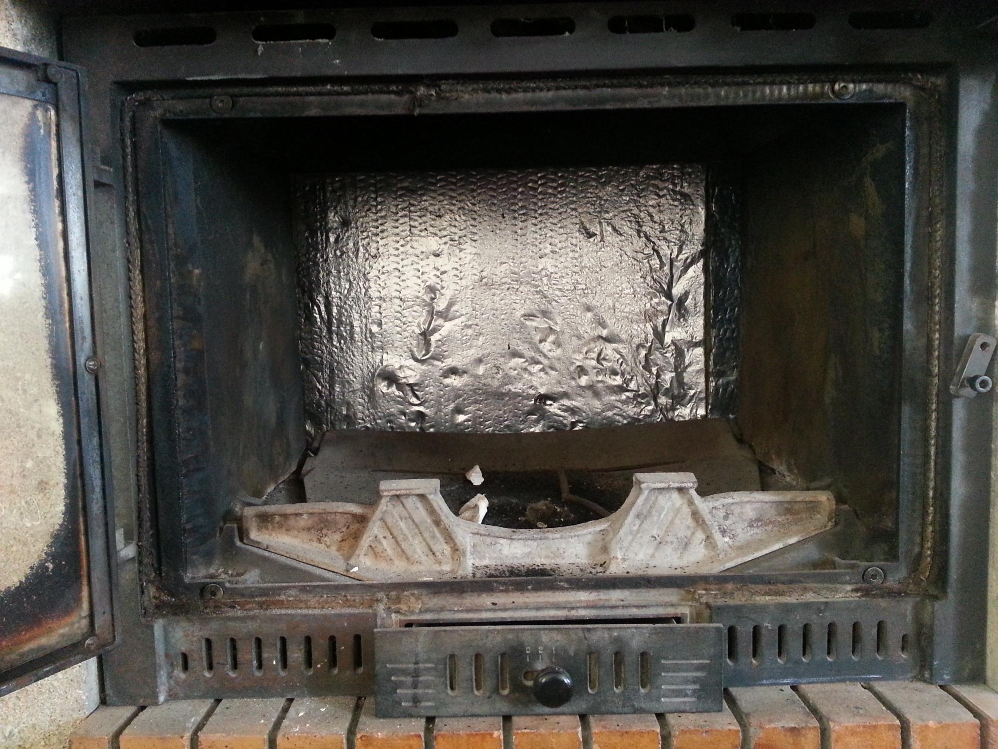 Remise en place d'une plaque en fonte de cheminée [résolu]